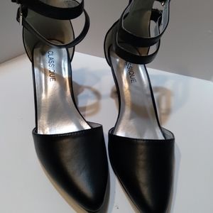 Classique black heels. 2.5 inch heel. New without tags.